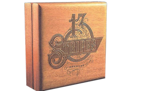 Engraved wooden box with a brewery logo on the lid